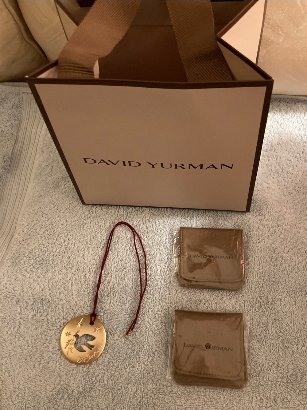 David Yurman gift bag, pendant, and jewelry holders a